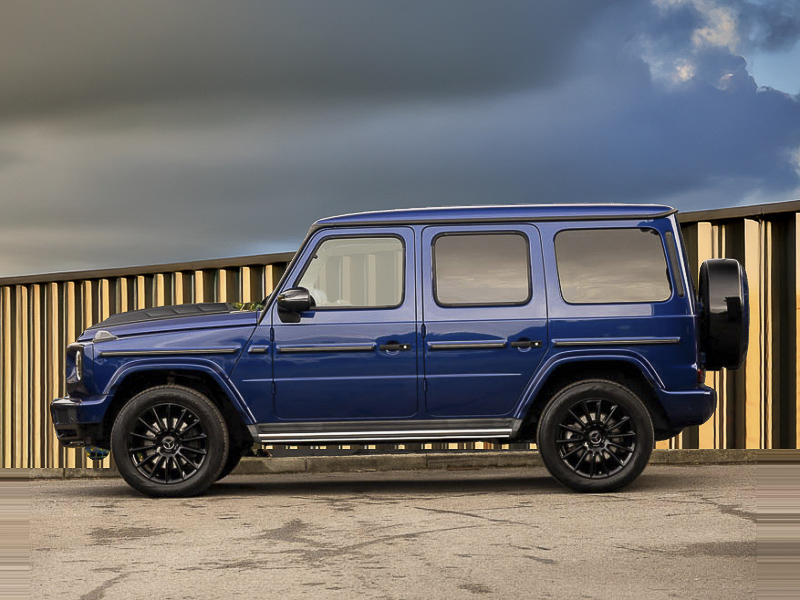 Blue Mercedes-Benz G-Class from the side on