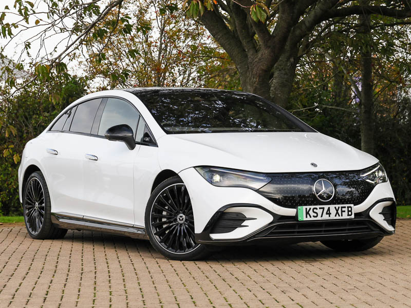 A white Mercedes-Benz EQE from the front