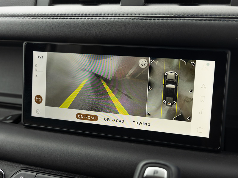 Land Rover Defender infotainment screen with reversing camera displayed